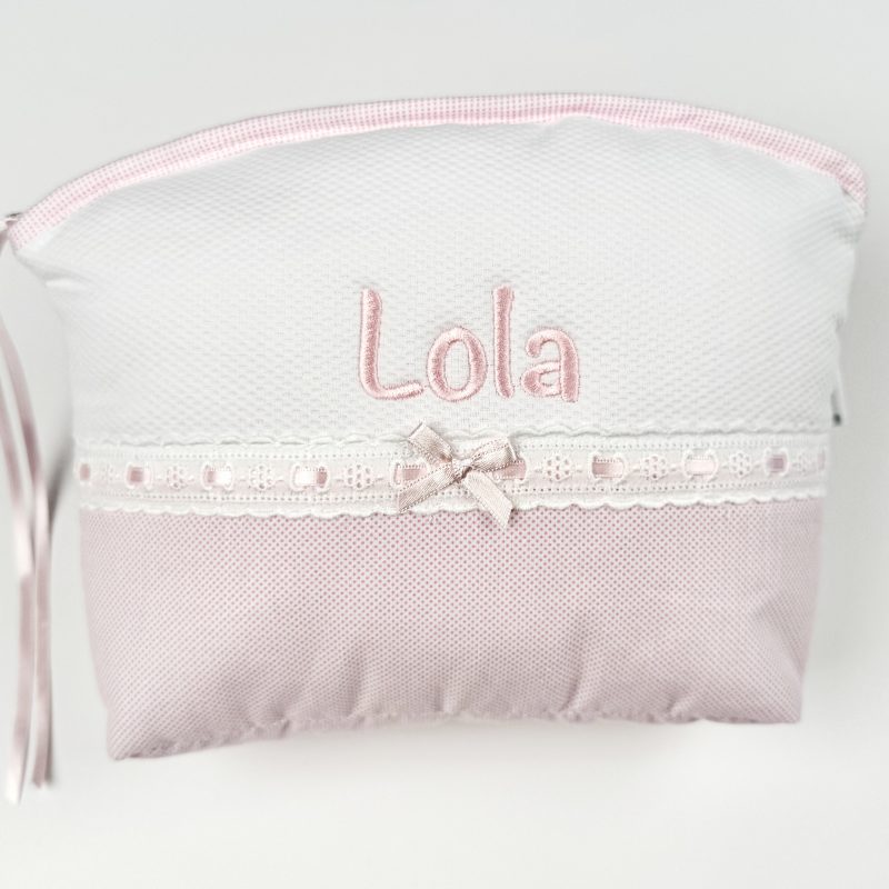 Neceser de bebé con topitos en rosa.