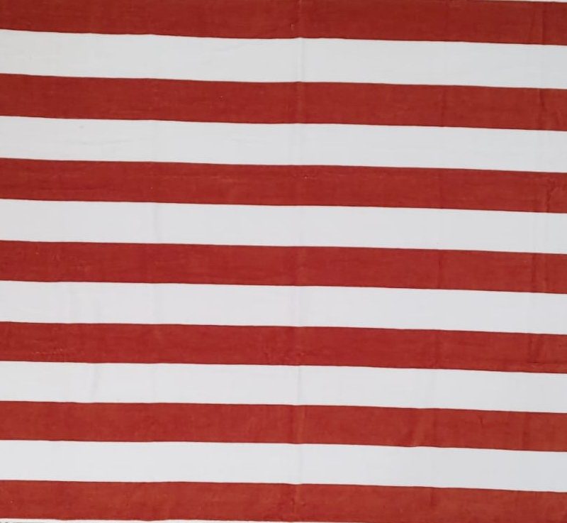 Toalla playa con rayas en blanco y teja